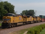 UP 7360 leads a westbound intermodal as it passes the Rochelle Railroad Park